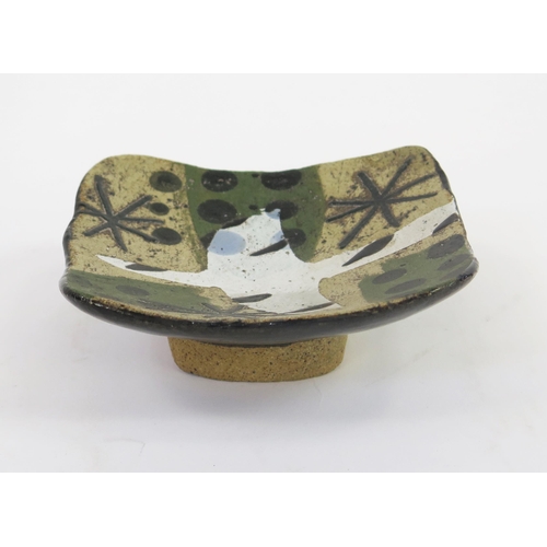 1340 - JOHN MALTBY (1936-2020) A small studio pottery dish with abstract stellar, dot and bird design, sign... 