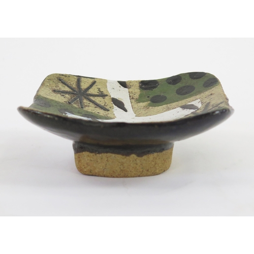 1340 - JOHN MALTBY (1936-2020) A small studio pottery dish with abstract stellar, dot and bird design, sign... 