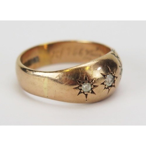 17 - An Antique 9ct Gold Three Stone Gypsy Ring with memorial inscription, size R.25, Birmingham 1917, 5.... 