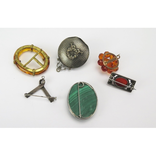 211 - A Silver and Carnelian Brooch and other brooches, etc.