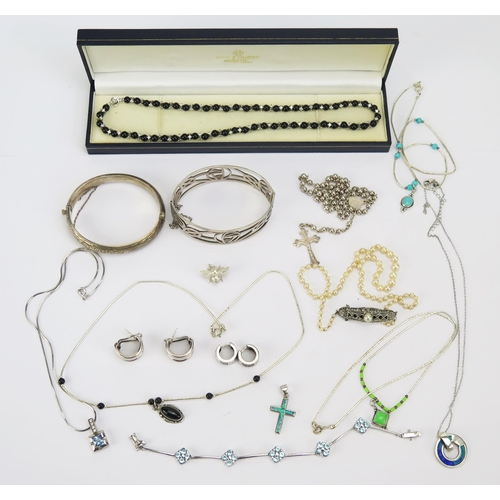 213 - A Quantity of Silver Jewellery including a hinged bangles, pendants, necklaces, c. 120g