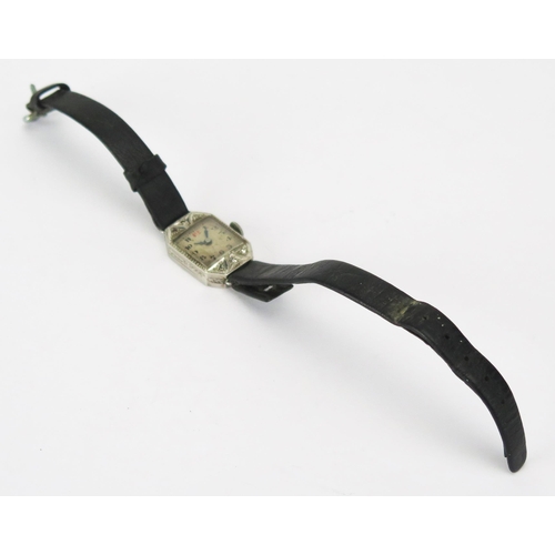 224 - A Lady's Platinum  and Diamond Set Wristwatch. Needs attention