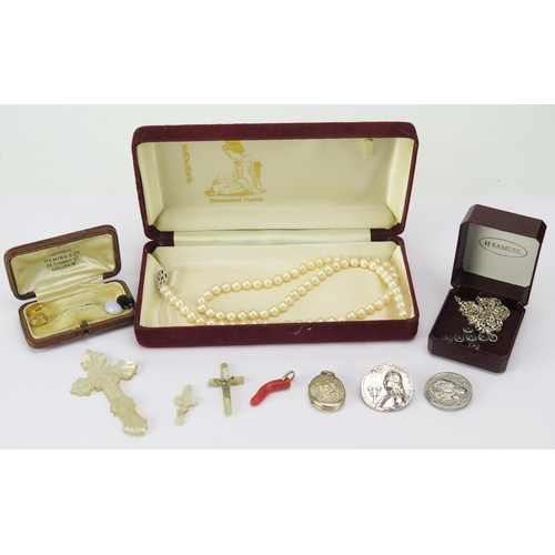 227 - A Coral Pendant with a precious yellow metal suspension loop (c. 30.1mm drop), a silver cross pendan... 