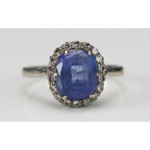 240 - An 18ct White Gold, Diamond and Tanzanite Set Ring, 2.5ct principal stone and .27ct of diamonds, siz... 