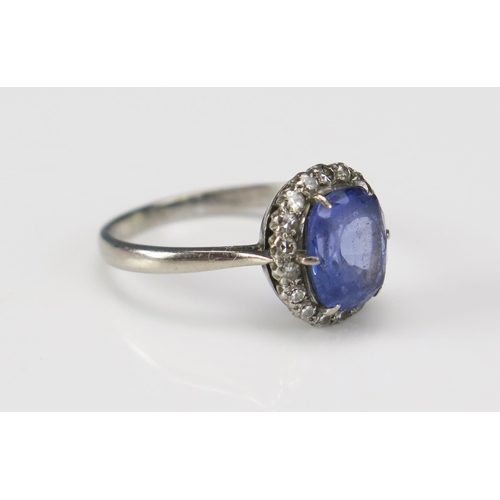 240 - An 18ct White Gold, Diamond and Tanzanite Set Ring, 2.5ct principal stone and .27ct of diamonds, siz... 