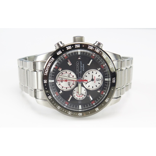 242 - A SEIKO Gent's Chronograph Wristwatch, cal. 7T52 with black, red and silver dial. Boxed and running