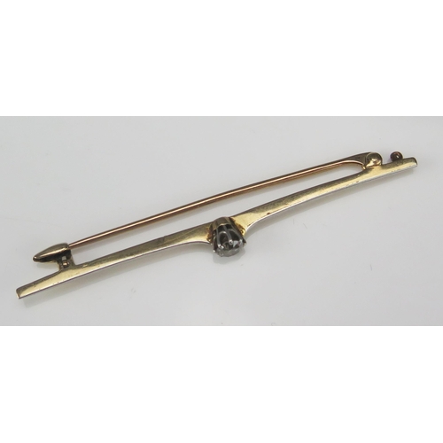 243 - A Diamond Bar Brooch in a high carat precious yellow and white metal setting, c. 59.4mm, c. 4mm ston... 