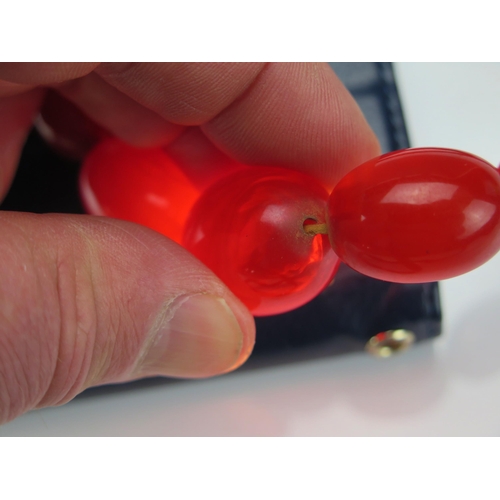 246 - A Faux Amber Graduated Bead Necklace, largest bead c. 29.5x21.5mm, 92cm, 67.5g