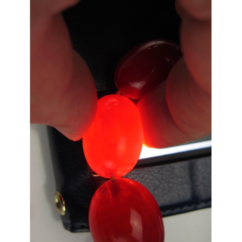 246 - A Faux Amber Graduated Bead Necklace, largest bead c. 29.5x21.5mm, 92cm, 67.5g