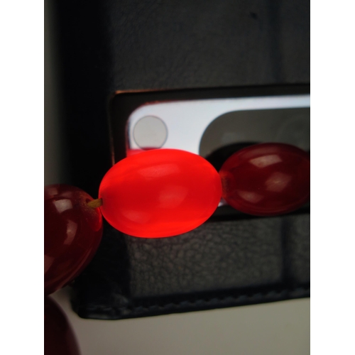 246 - A Faux Amber Graduated Bead Necklace, largest bead c. 29.5x21.5mm, 92cm, 67.5g