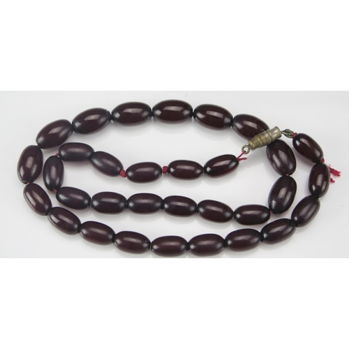 248 - A Faux Amber Bead Necklace, largest bead14.3x8.9mm, 43cm, 18.42g