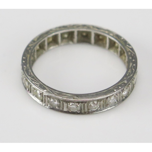 255 - A Platinum and Diamond Eternity Ring, c. 2.4mm brilliant round cuts, 3.7mm wide, size O.25, 5.1g