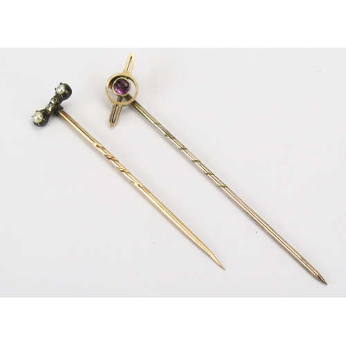 70 - A 9ct Gold Stick Pin with red stone (stamped 9CT) and one other precious yellow metal stick pin with... 