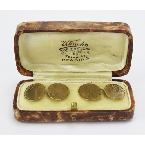 98 - A Cased Pair of 9ct Gold Cufflinks with engine turned decoration, Chester 1929, 5.37g