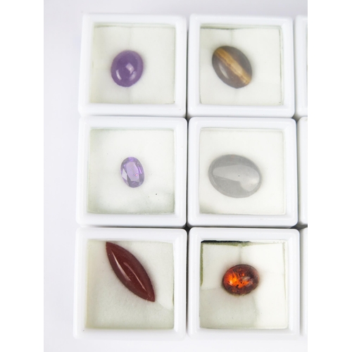78 - A Parcel of 12 Loose Mixed Gemstones, all individually boxed and including tiger's eye, amethyst, sa... 