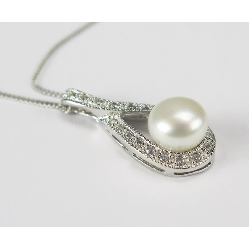 79 - A Silver Pear Shaped Pendant set with cultured pearl and cubic zirconia on a silver chain
