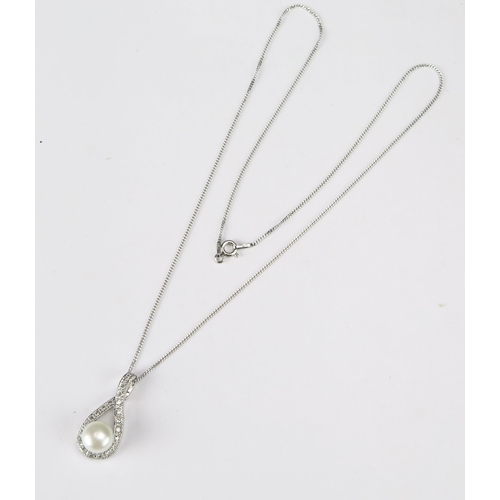 79 - A Silver Pear Shaped Pendant set with cultured pearl and cubic zirconia on a silver chain