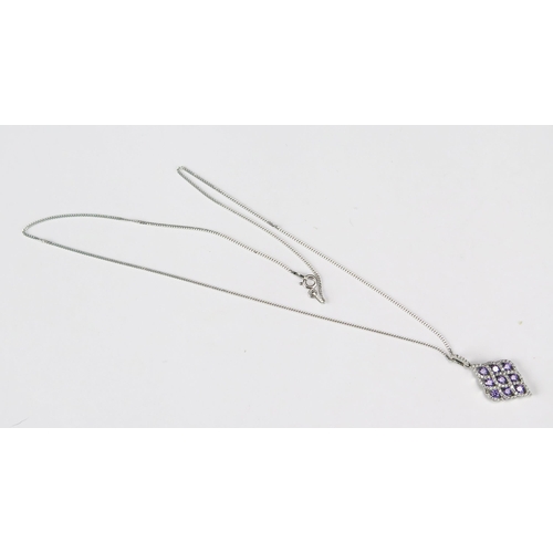 80 - A Silver Pendant set with purple and white cubic zirconia on a silver chain