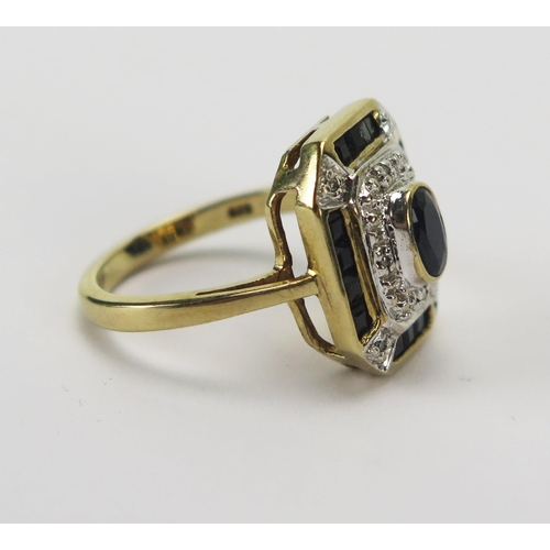 21 - A 9ct Gold, Sapphire and Diamond panel Ring, 16.5x14.1mm head, size L.5, Birmingham hallmark, 4.3g. ... 