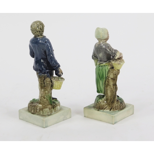 1532 - A pair of early 19th century Staffordshire pearlware figures of fruit pickers, 18cm and 16.5cm high ... 
