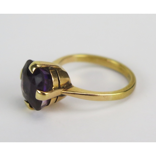 26 - 18ct Gold and Amethyst Solitaire Ring, c. 9.3-9.6mm stone, size J.25, stamped 18CT, 3.93g