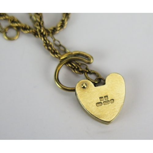 27 - 9ct Gold Bracelet with 'padlock' clasp, CCM mark to clasp and link, 3.89g. A/F