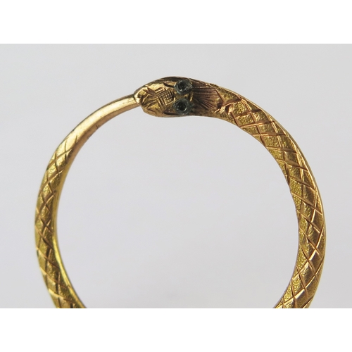 43 - 19th Century Hinged Ring in precious yellow metal with snake head decoration, c. 24.3mm outer diam.,... 