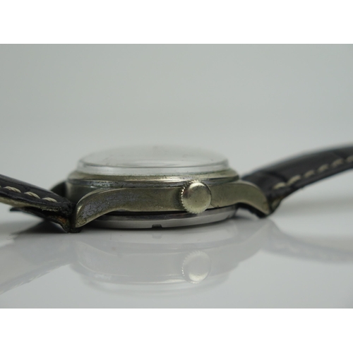 44 - WWII RECORD WATCH Co., GENF German Military Manual Wind Wristwatch, the 33.7mm stainless steel case ... 