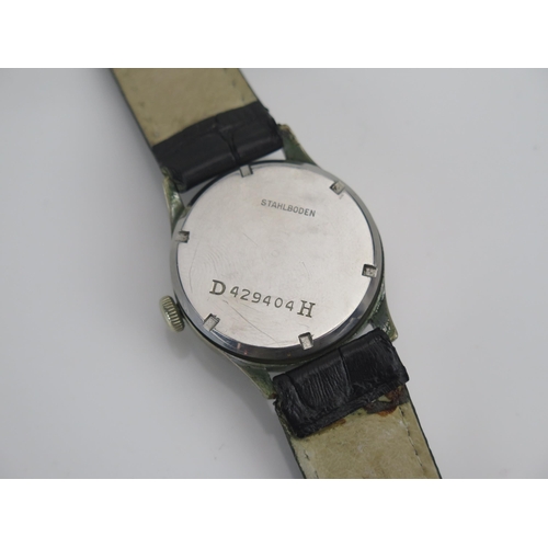 44 - WWII RECORD WATCH Co., GENF German Military Manual Wind Wristwatch, the 33.7mm stainless steel case ... 