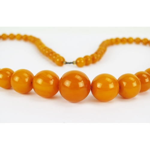47 - Graduated Amber Circular Bead Necklace, largest bead 21.25x20.8mm, 78cm, 80.31g
