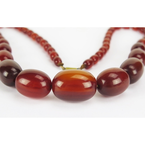 49 - Faux Amber Graduated Oval Bead Necklace, largest 28.6x20.93mm, 60cm, 63.5g