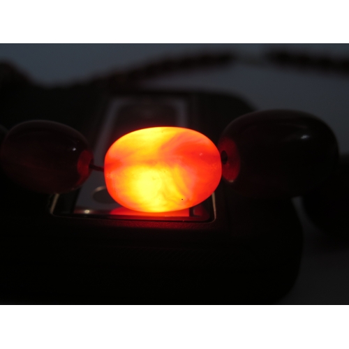 49 - Faux Amber Graduated Oval Bead Necklace, largest 28.6x20.93mm, 60cm, 63.5g