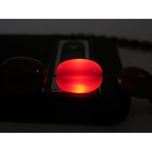 49 - Faux Amber Graduated Oval Bead Necklace, largest 28.6x20.93mm, 60cm, 63.5g