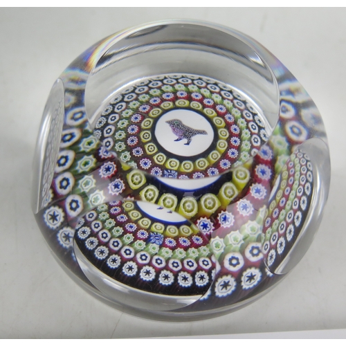 A St Louis glass paperweight with offset concentric rings, single cane ...
