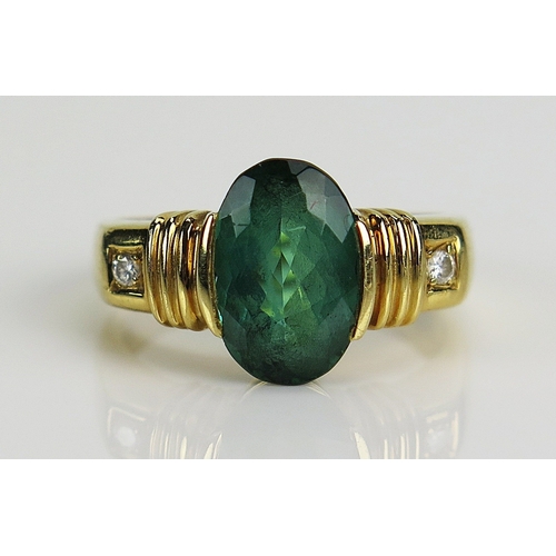 20 - 18ct yellow gold, green tourmaline and diamond, c. 11.2x7.2mm principal stone, size L.5, stamped 750... 