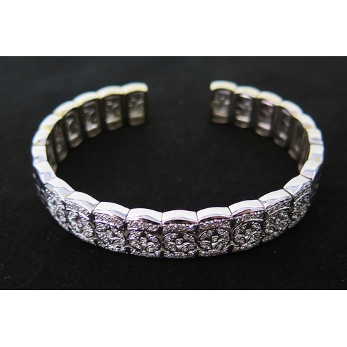 29 - 18ct white gold and diamond BRACELET, 12mm wide, 17.5cm, stamped Khalid 750, 41.24g. SEE LOT 28 FOR ... 