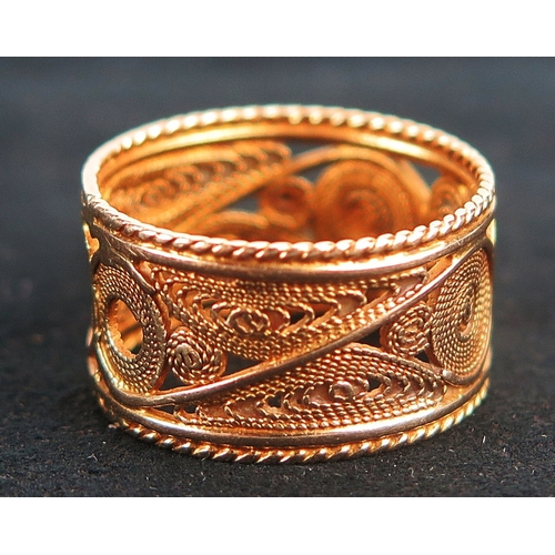 47 - Maltese 18ct gold filigree band decorated with a heart motif, 10mm wide, size K, stamped 18, 4.04g