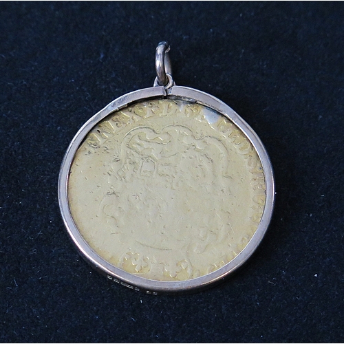 5 - George III gold Guinea pendant in a 9ct gold surround, 9.51g