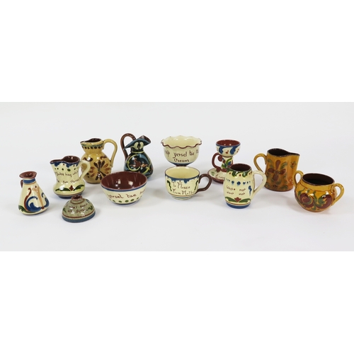 Hart & Moist (Exeter) Pottery motto ware and others including jugs ...