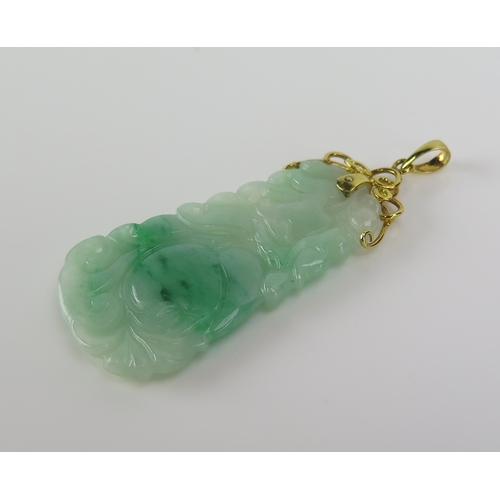 108 - A Chinese carved jade pendant decorated with gourds, 53mm drop, 6.85g
