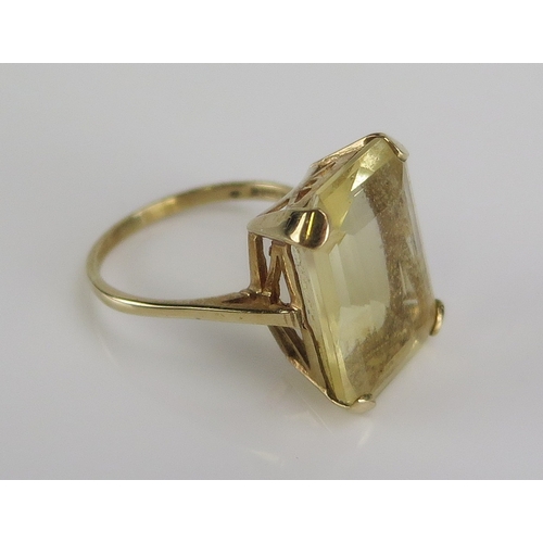 19 - A citrine ring in a 9ct yellow gold setting, 20x15mm stone, size S, hallmarked, 6.7g. Boxed