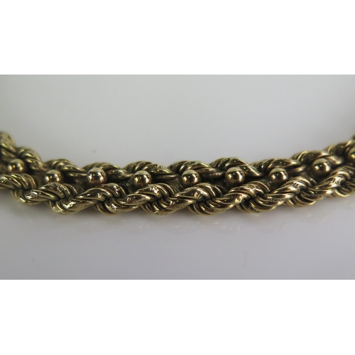 382 - A 9ct gold necklace with rope twist and ball linked decoration, 40cm long, hallmarked, 73.8g. Boxed