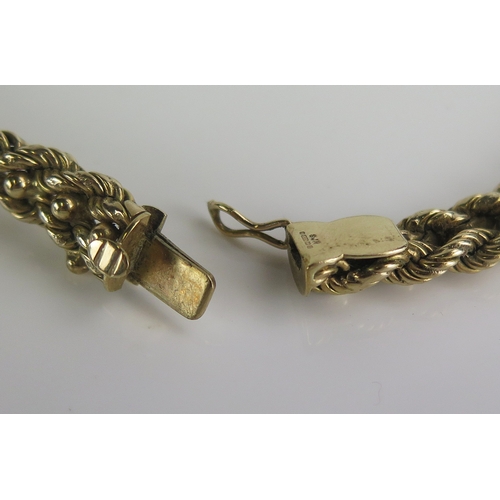 382 - A 9ct gold necklace with rope twist and ball linked decoration, 40cm long, hallmarked, 73.8g. Boxed