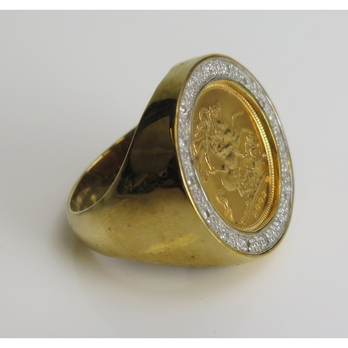 39 - A Half Sovereign Ring with diamond surround in a 9ct yellow gold setting, size S.75, CCM mark, 16.96... 