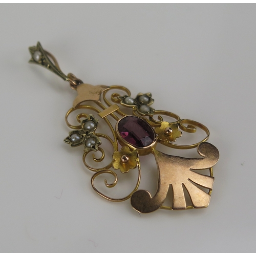 47 - An antique garnet and seed pearl pendant in a 9ct yellow god setting, 44mm drop, stamped 9CT S.BROS,... 