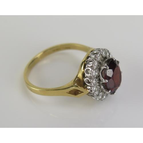 49 - Shipton & Co. garnet and diamond cluster ring in an 18ct yellow gold setting, c. 15x13.3mm head, siz... 