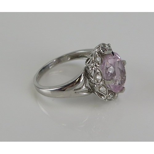 59 - A pink topaz and diamond cluster ring in a 9ct white gold setting, c. 18x15.5mm, size S.5, hallmarke... 