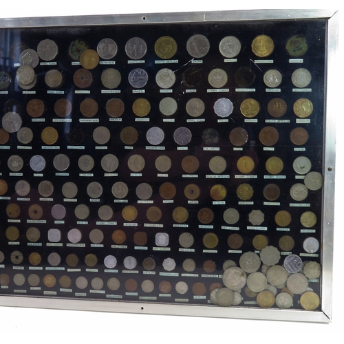 A framed and glazed coin display