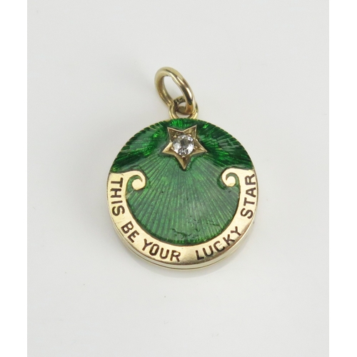 223 - A diamond and green guilloche enamel locket in a high carat precious yellow metal, the c. 2.2mm old ... 