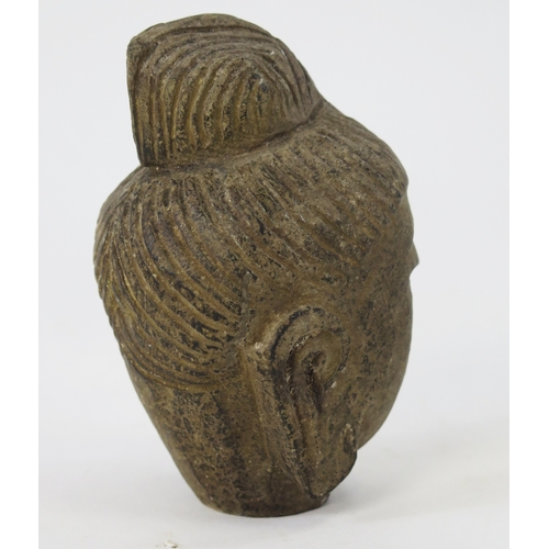 1103 - A carved hardstone Buddha's head, 14cm high.